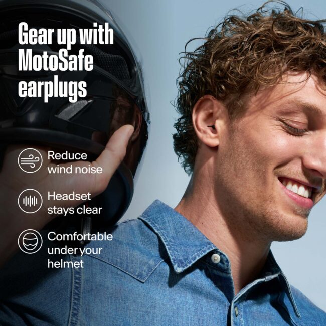 Motorcycle rider wearing Alpine MotoSafe Tour earplugs for wind noise reduction under a helmet.
