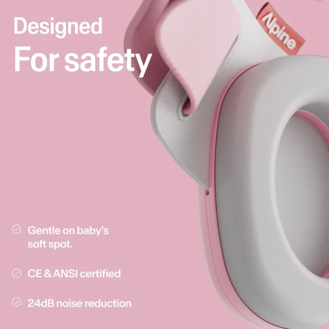 Baby wearing Alpine Muffy Baby hearing protection